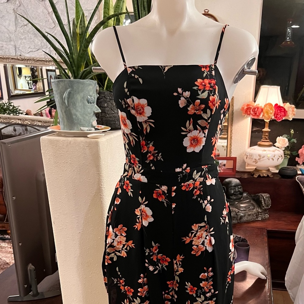 Floral jumpsuit; size S; excellent condition; polyester; ties in the back